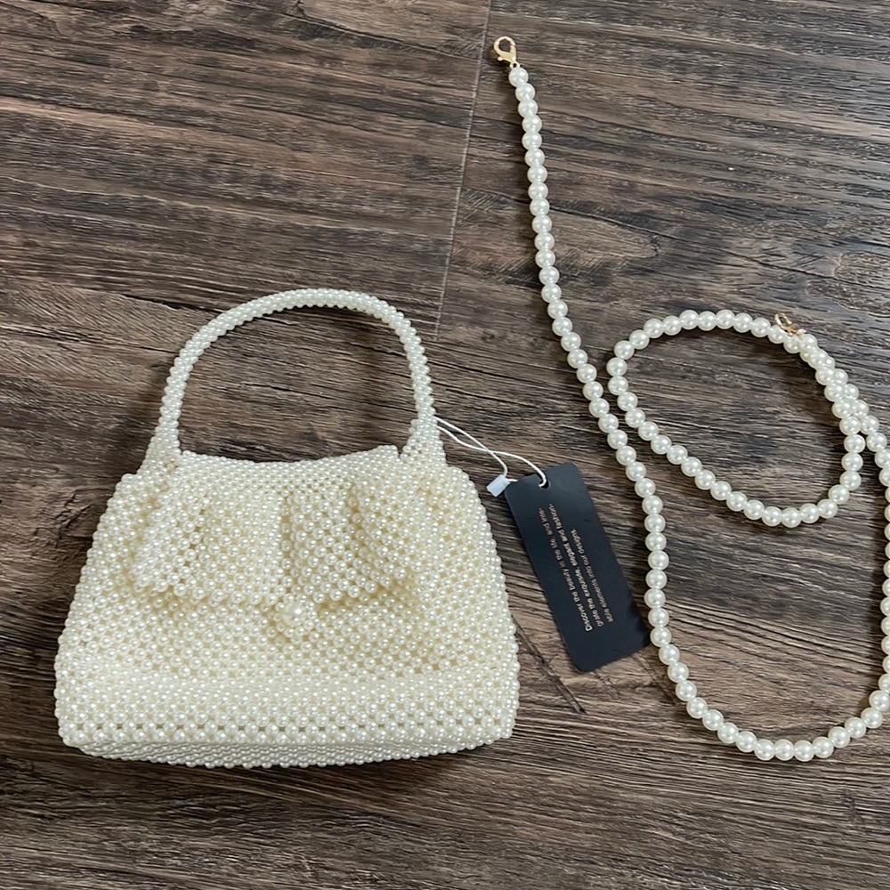 Cream pearl bag with inside zipper and extra pearl long strap